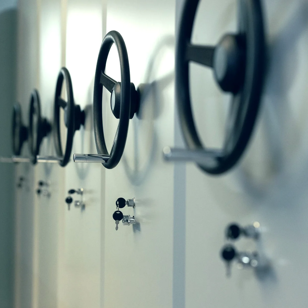 A wall of safe-deposit locker handles.