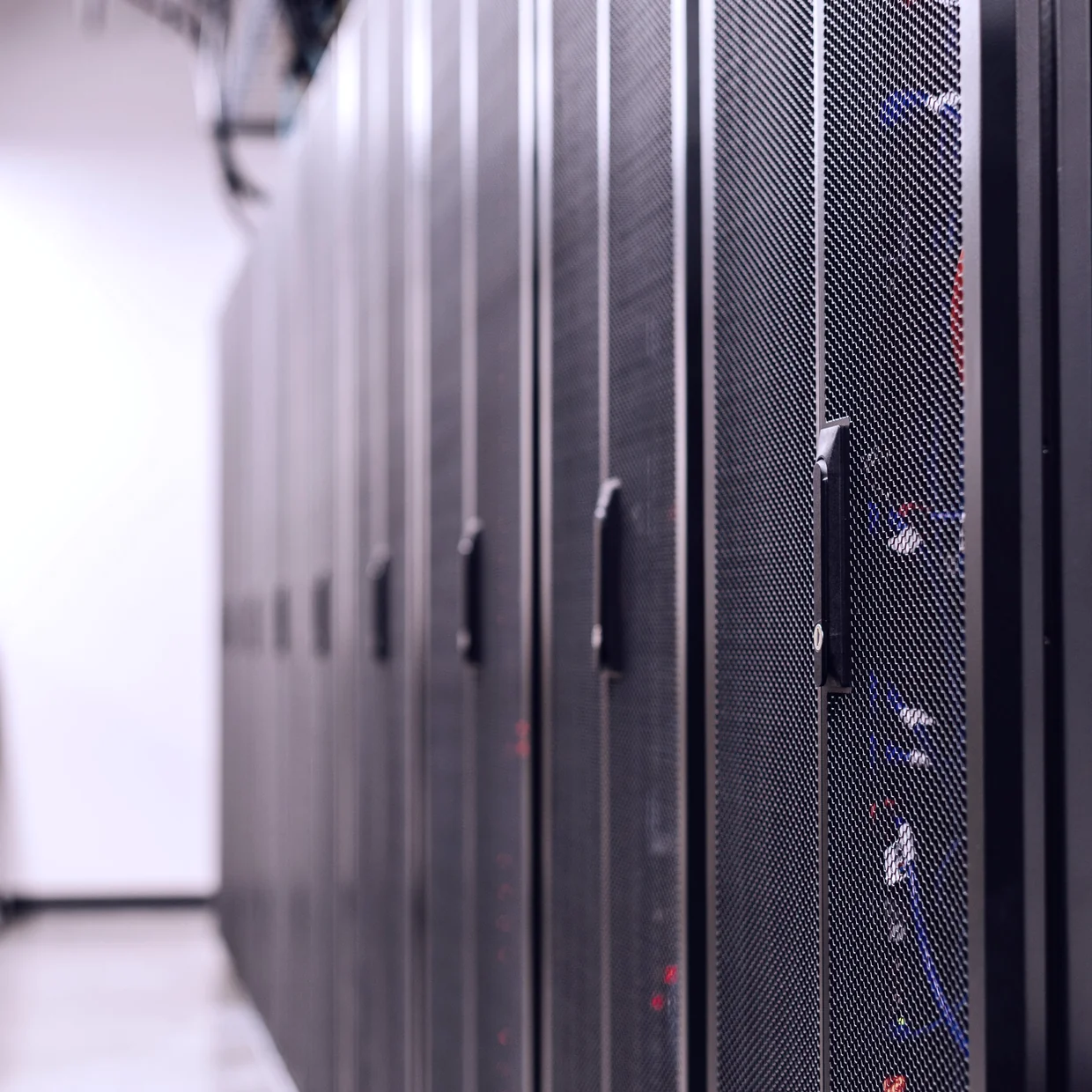 A row of server racks in an EU data centre.